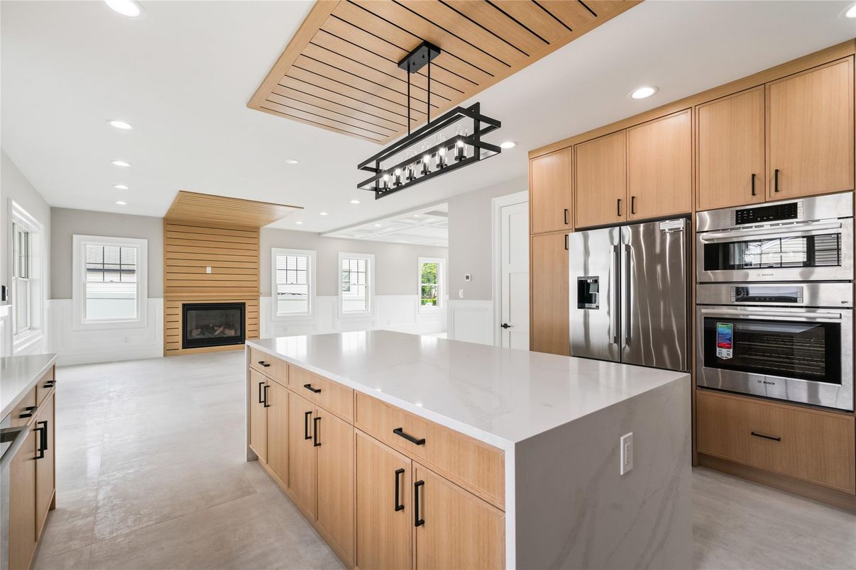 Fireplace, Interior, Kitchen, Pendant Lights, Recessed Lighting, Stainless Steel Appliances, Wooden Ceilings