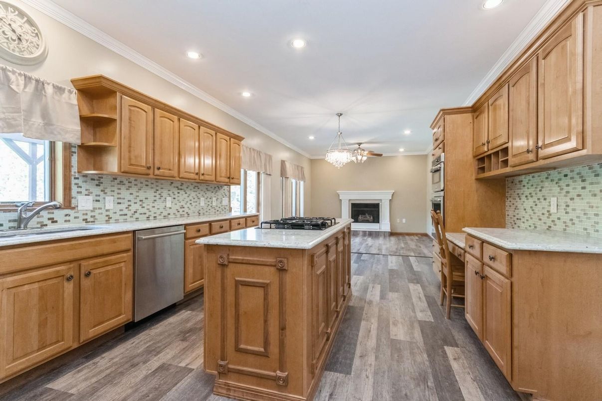 Chandelier, Fireplace, Interior, Kitchen, Recessed Lighting, Wood Texture Flooring