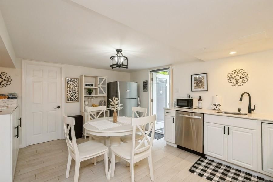 Dining room, Interior, Kitchen, Recessed Lighting, Stainless Steel Appliances, Wood Texture Flooring