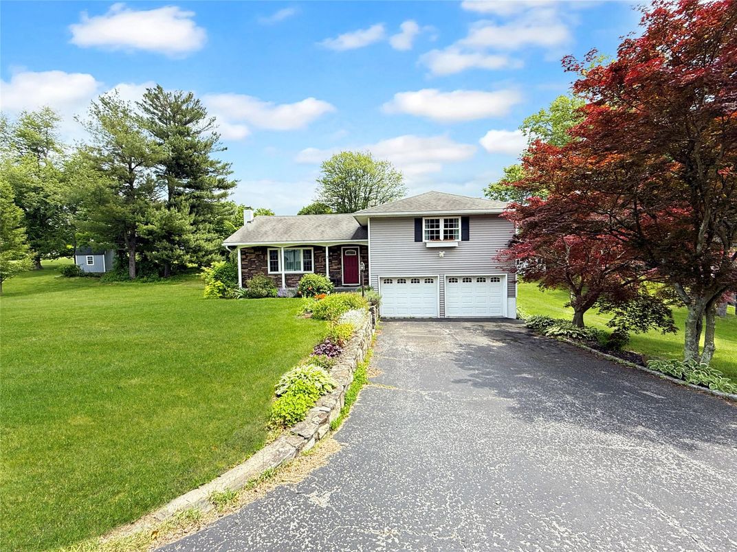 Attached, Exterior, Facade, Raised Ranch