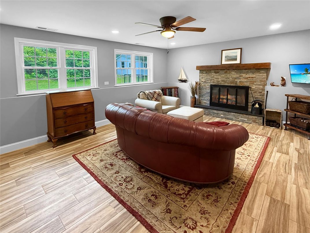 Fireplace, Interior, Living room, Recessed Lighting, Wood Texture Flooring