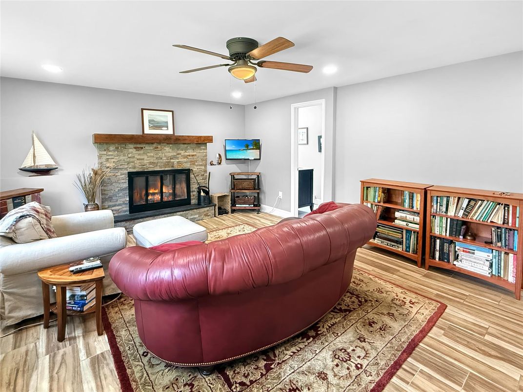 Fireplace, Interior, Living room, Recessed Lighting, Wood Texture Flooring