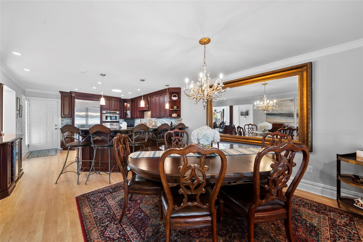 Chandelier, Dining room, Interior, Kitchen, Recessed Lighting, Stainless Steel Appliances, Wood Texture Flooring
