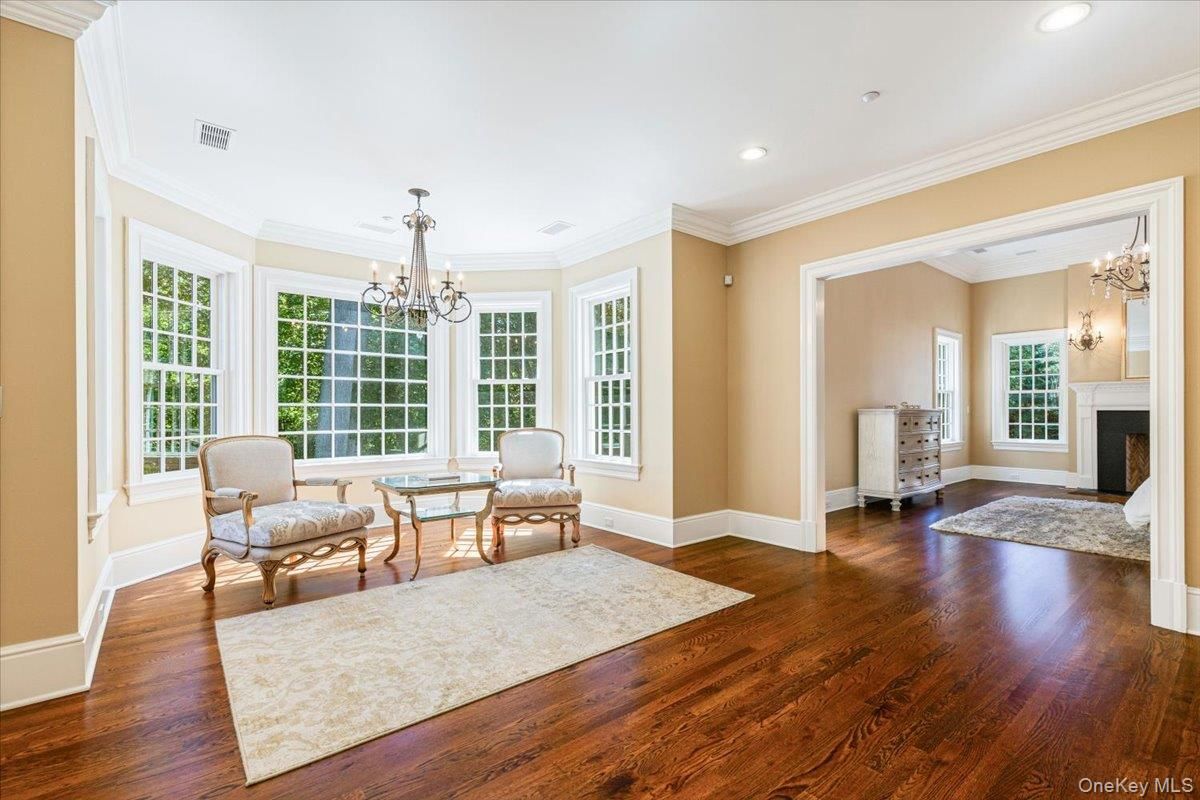 Chandelier, Fireplace, Interior, Living room, Recessed Lighting, Wood Texture Flooring