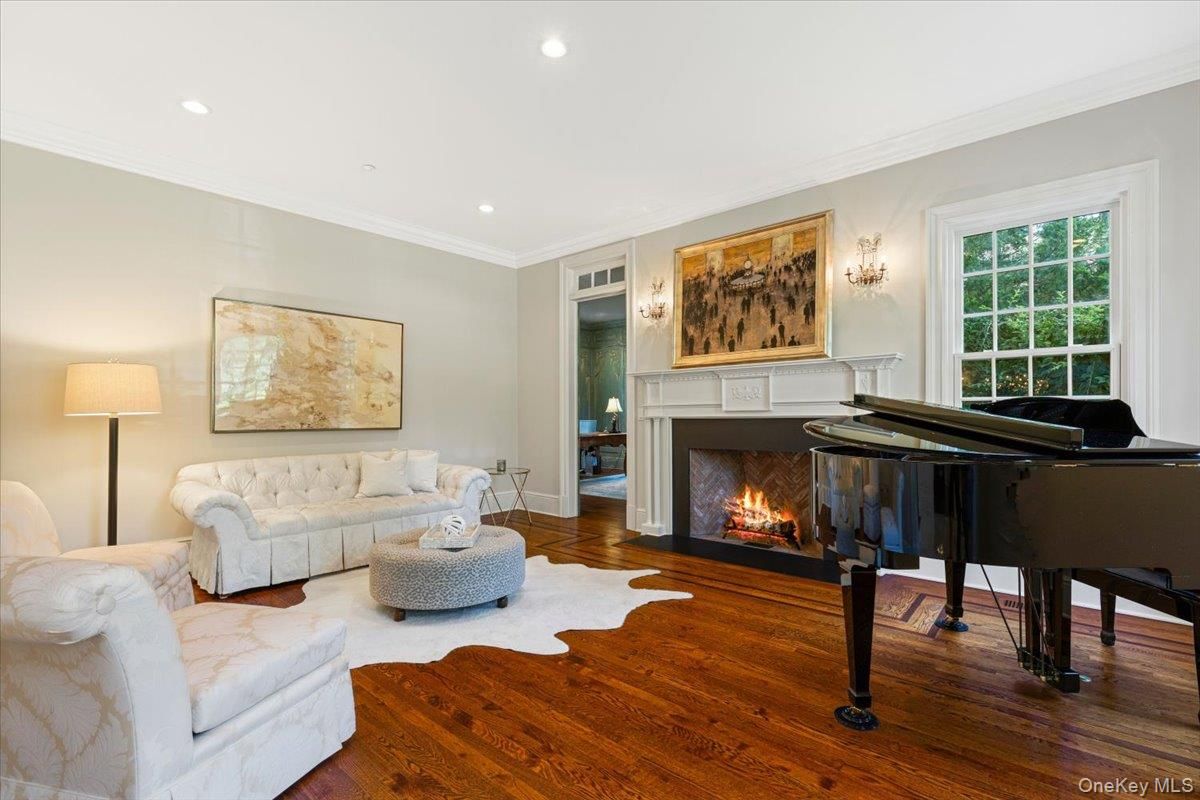 Fireplace, Interior, Living room, Piano, Recessed Lighting, Wood Texture Flooring