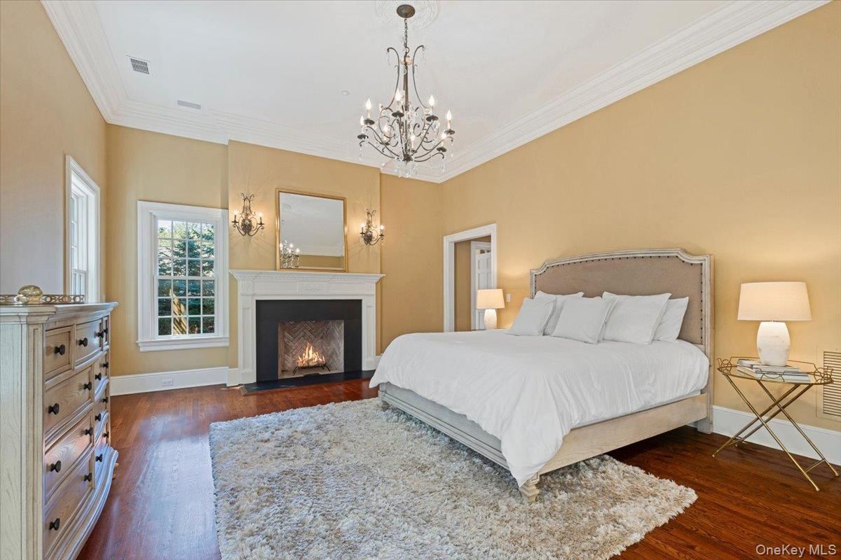 Bedroom, Chandelier, Fireplace, Interior, Wood Texture Flooring