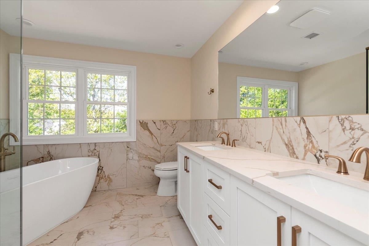 Bathroom, Dual Sink Vanities, Free Standing Baths, Interior, Marble, Marble Walls, Recessed Lighting