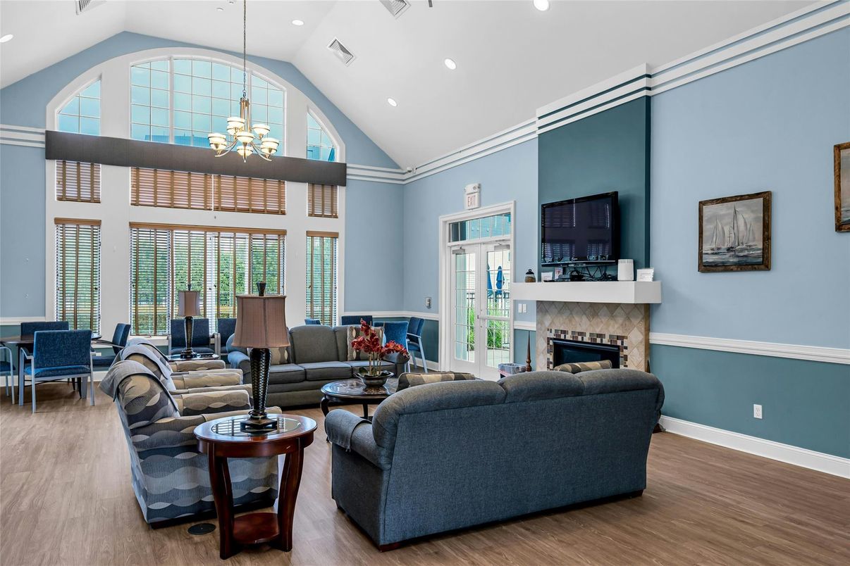 Dining room, Fireplace, Interior, Living room, Recessed Lighting, Wood Texture Flooring