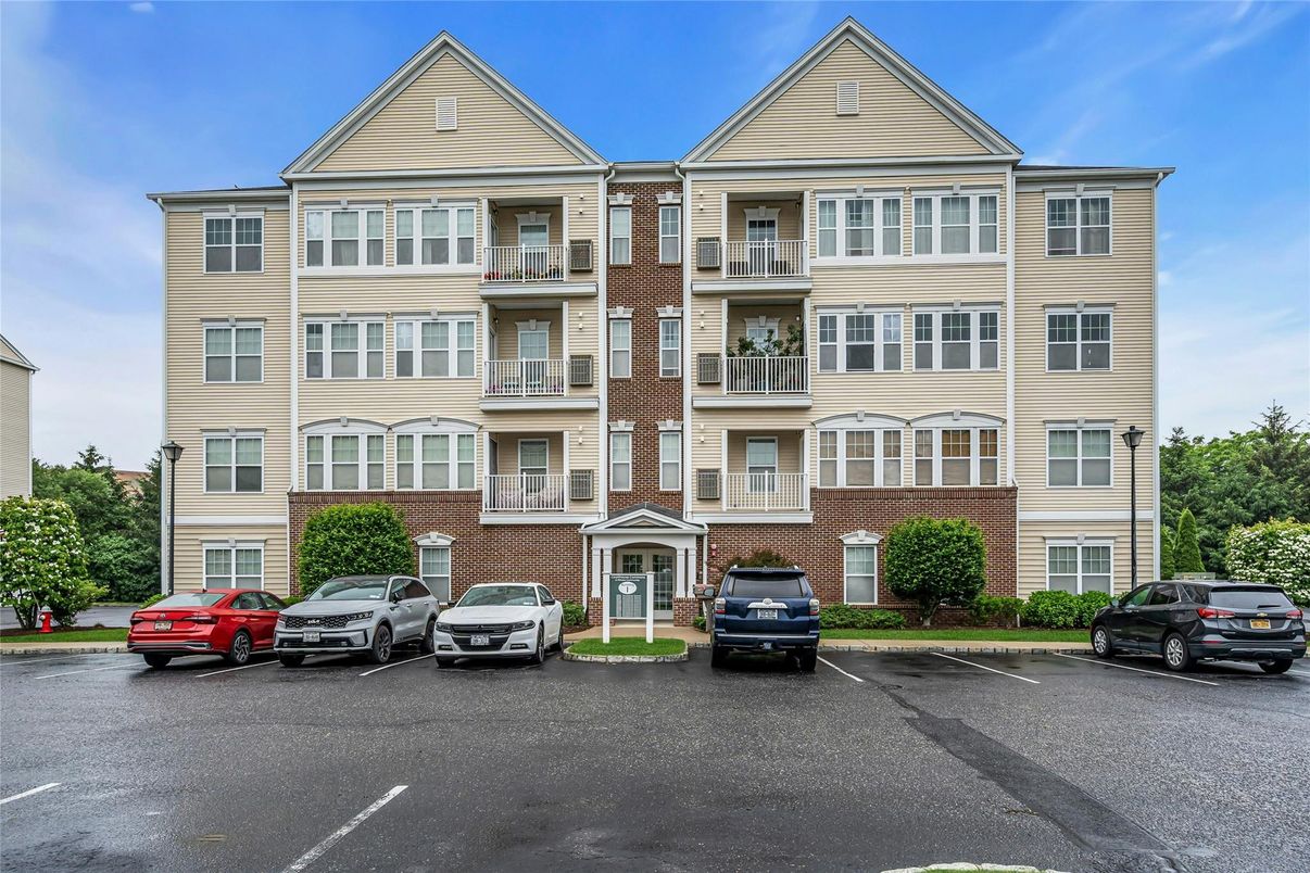 Exterior, Facade, Brick Facade, Condo Building