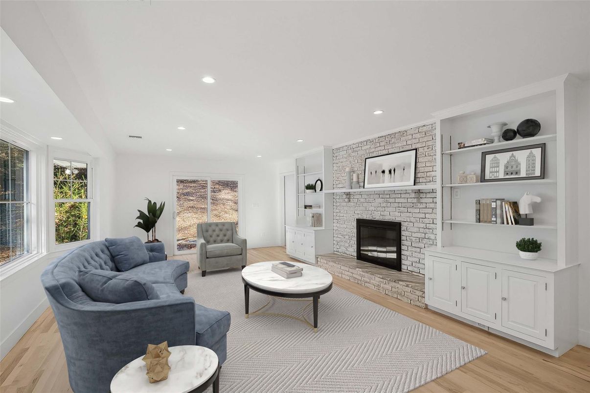 Fireplace, Interior, Living room, Recessed Lighting, Stone Walls, Wood Texture Flooring