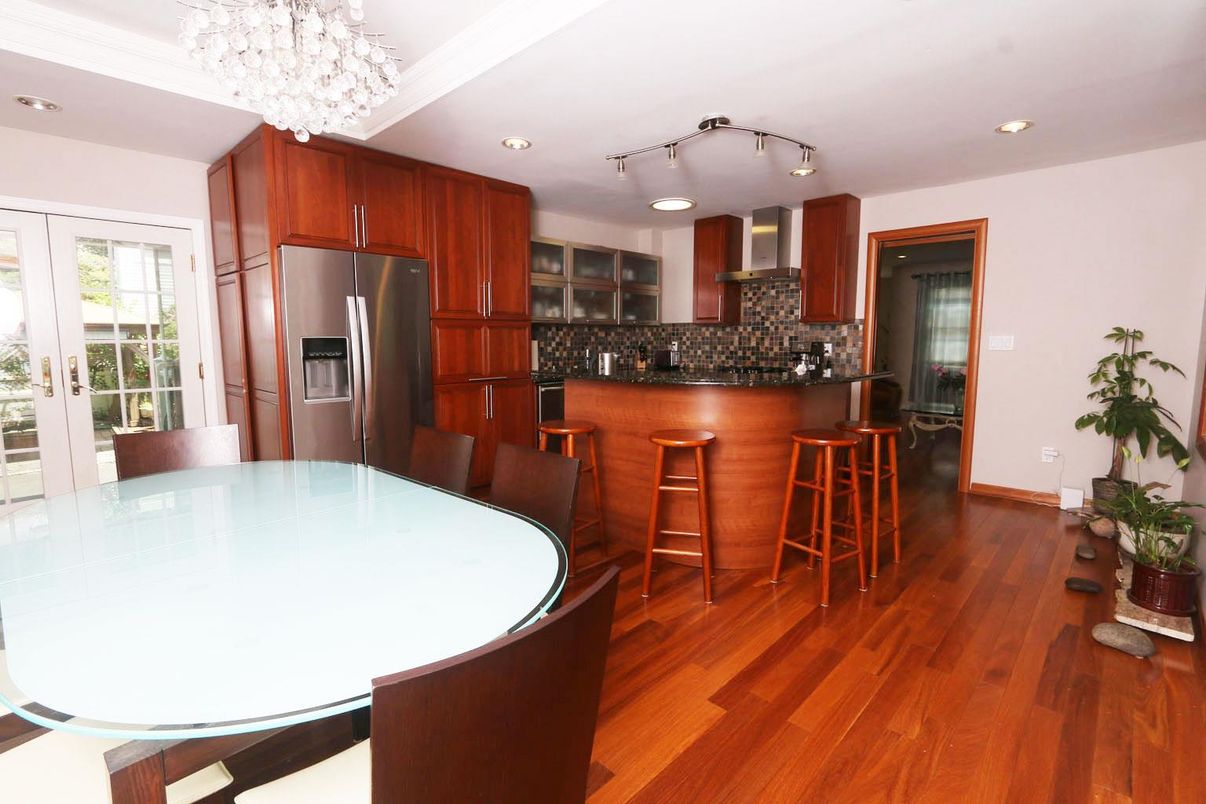 Chandelier, Dining room, Interior, Kitchen, Recessed Lighting, Stainless Steel Appliances, Wood Texture Flooring