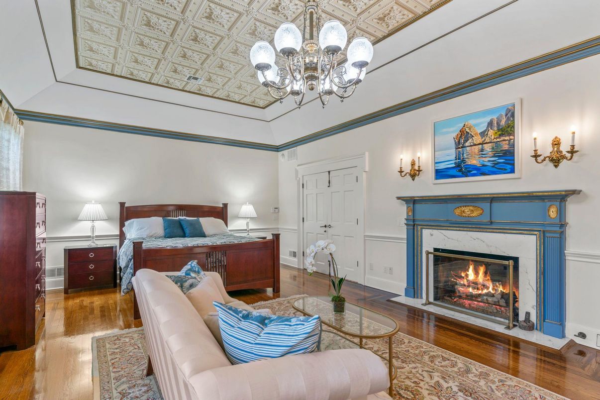 Bedroom, Chandelier, Fireplace, Interior, Wood Texture Flooring