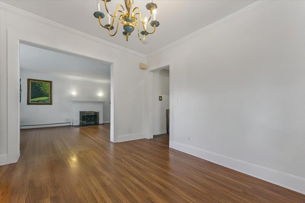 Chandelier, Empty room, Fireplace, Interior, Wood Texture Flooring