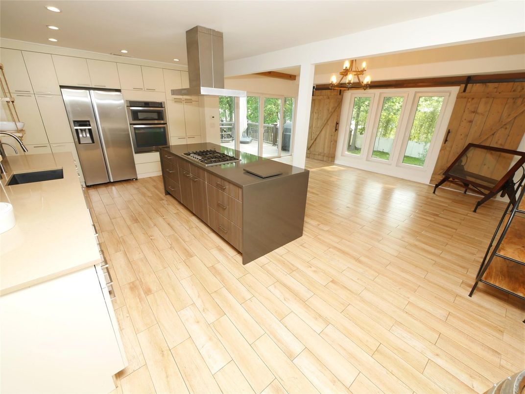 Chandelier, Interior, Kitchen, Recessed Lighting, Stainless Steel Appliances, Wood Texture Flooring