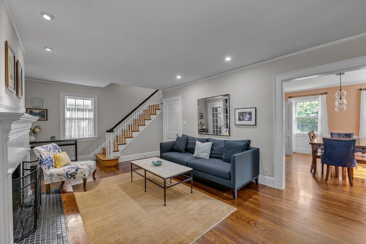 Dining room, Fireplace, Interior, Living room, Pendant Lights, Recessed Lighting, Wood Texture Flooring