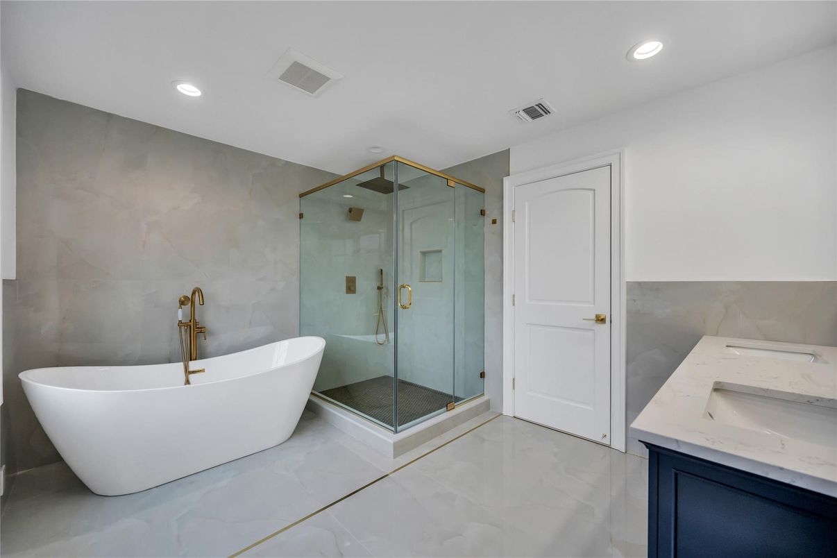 Bathroom, Dual Sink Vanities, Free Standing Baths, Glass Shower, Interior, Marble, Recessed Lighting
