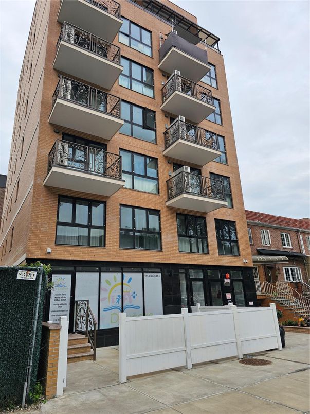 Exterior, Facade, Brick Facade, Condo Building