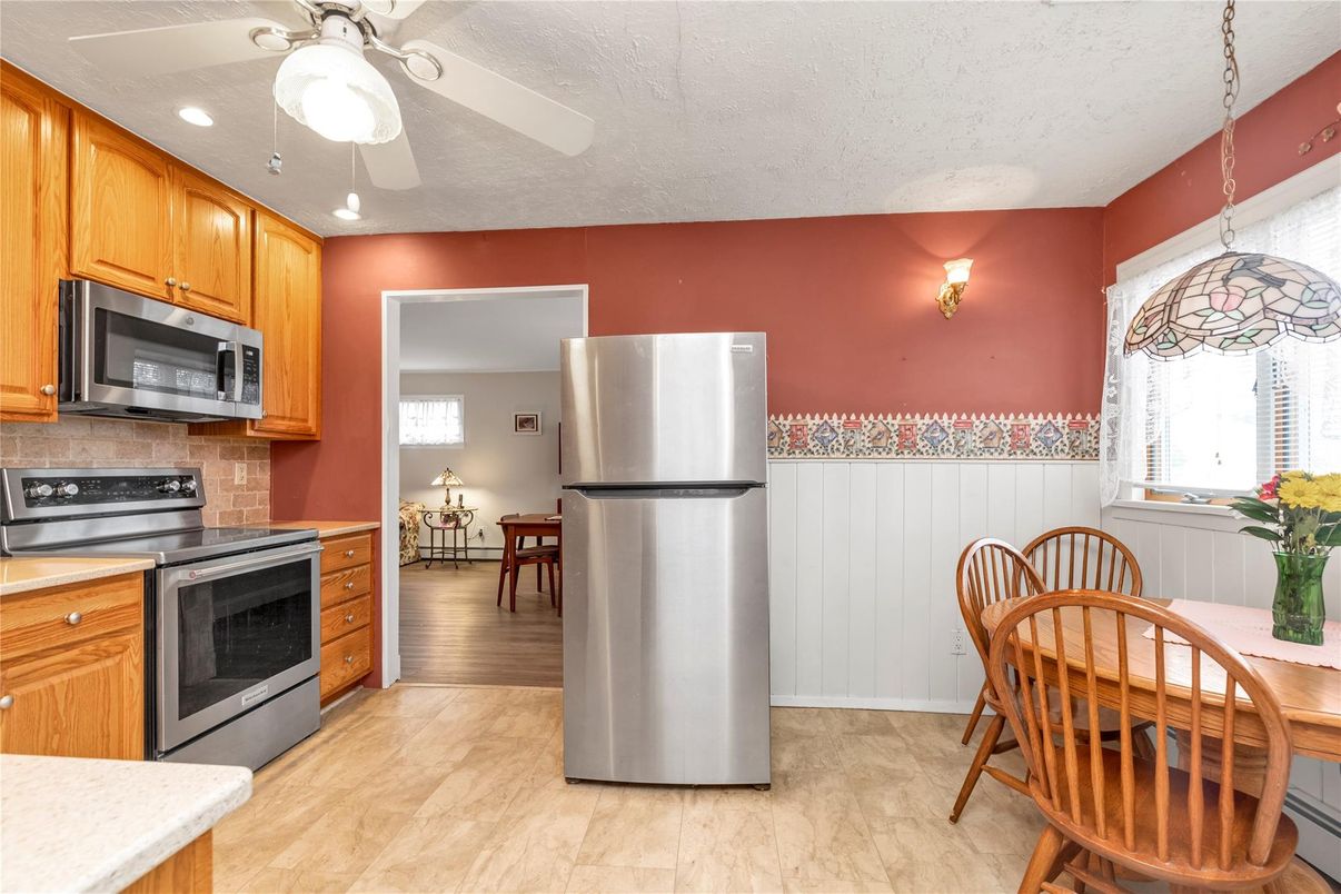 Dining room, Interior, Kitchen, Recessed Lighting, Stainless Steel Appliances, Wood Texture Flooring