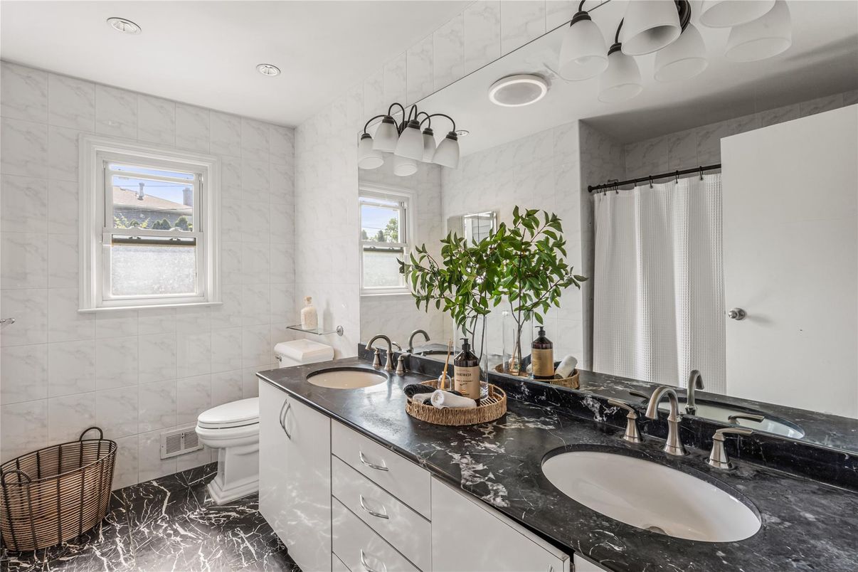 Bathroom, Dual Sink Vanities, Interior, Marble, Marble Walls, Recessed Lighting