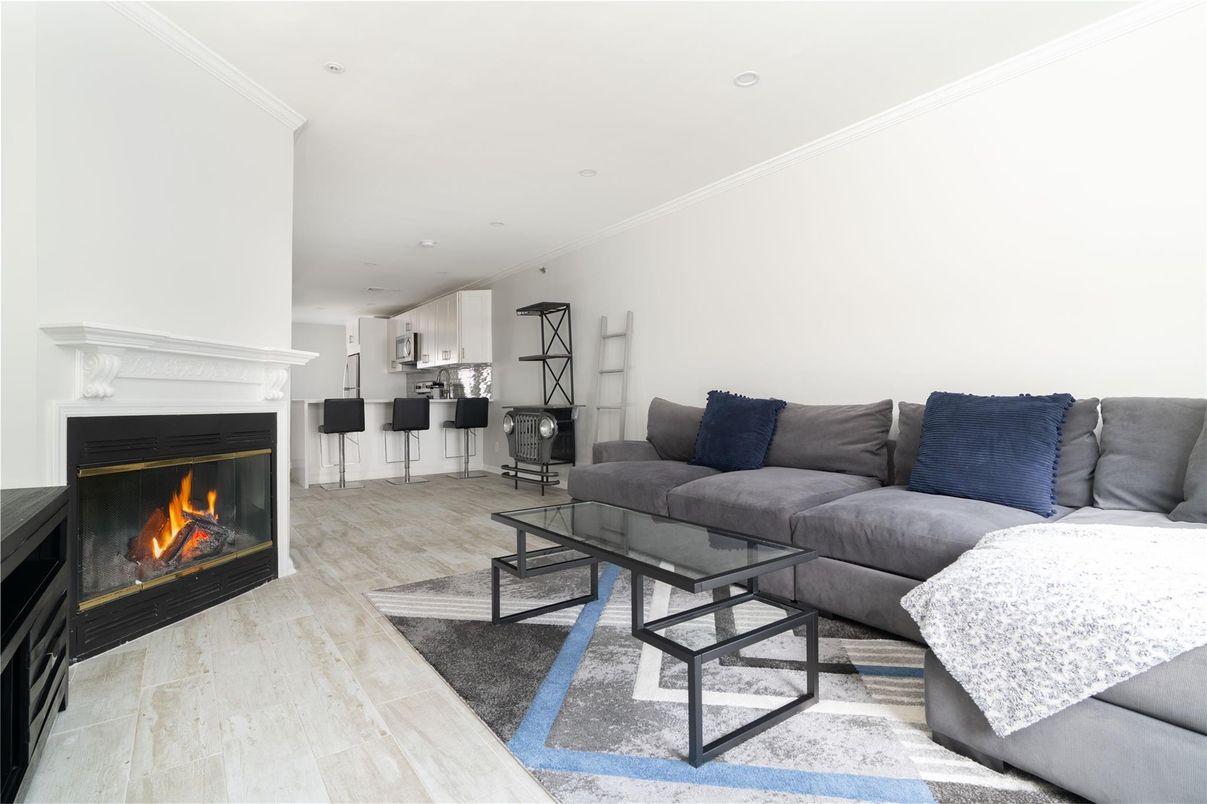 Fireplace, Interior, Living room, Recessed Lighting, Wood Texture Flooring