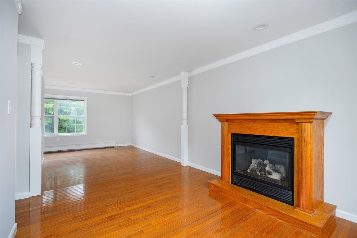Empty room, Fireplace, Interior, Recessed Lighting, Wood Texture Flooring