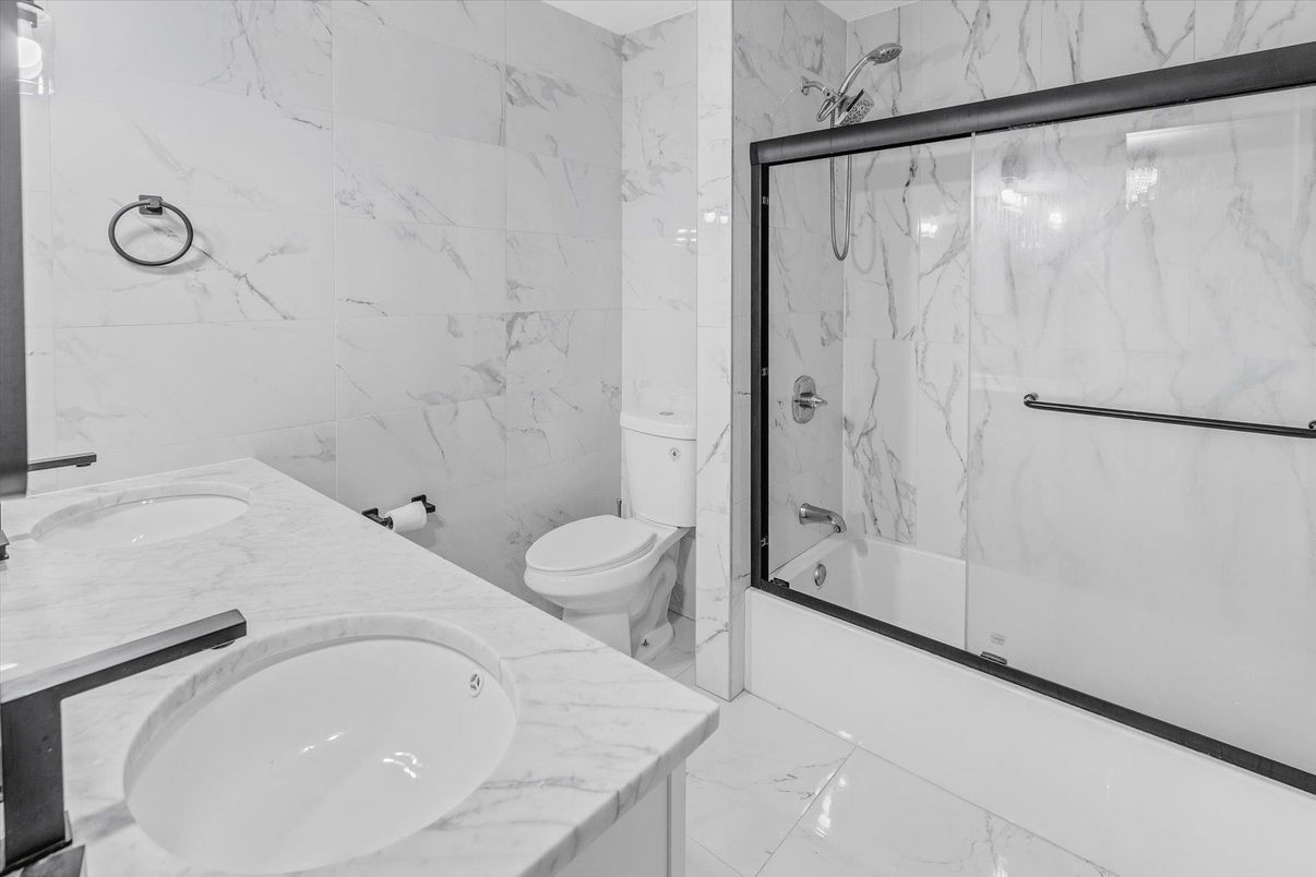 Bathroom, Dual Sink Vanities, Glass Shower, Interior, Marble, Marble Walls