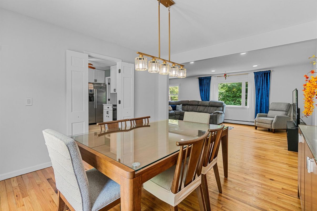 Dining room, Interior, Kitchen, Living room, Pendant Lights, Recessed Lighting, Stainless Steel Appliances, Wood Texture Flooring