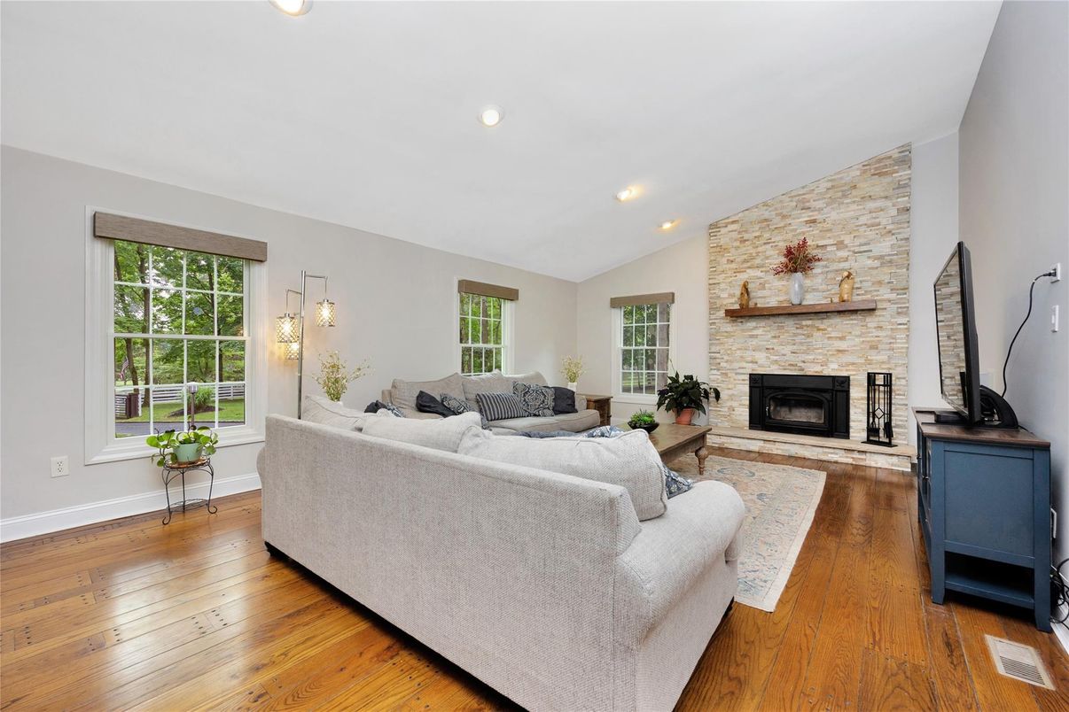 Fireplace, Interior, Living room, Pendant Lights, Recessed Lighting, Stone Walls, Wood Texture Flooring