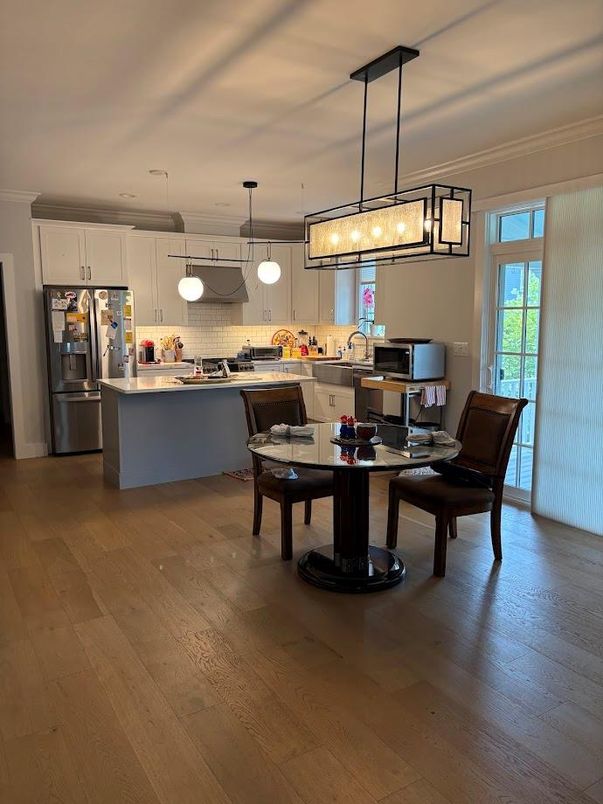 Dining room, Interior, Kitchen, Pendant Lights, Stainless Steel Appliances, Wood Texture Flooring
