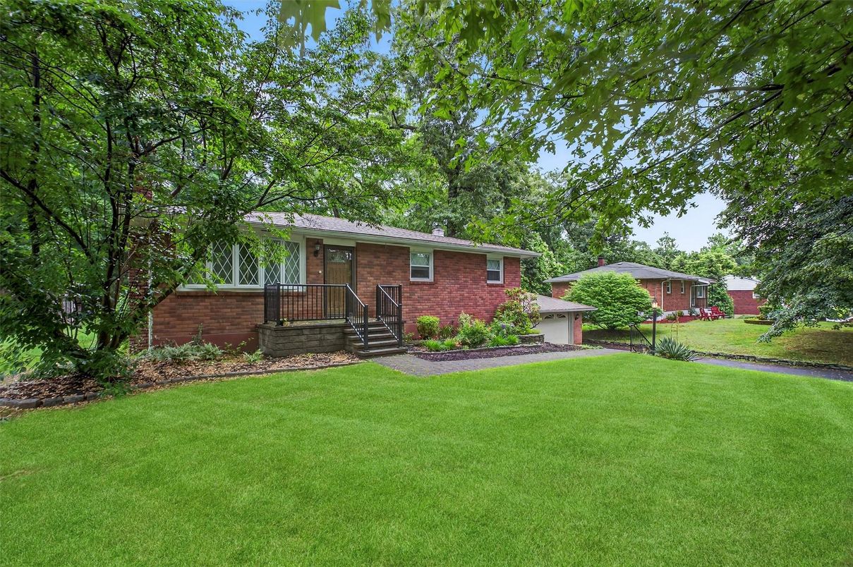 Attached, Backyard, Exterior, Facade, Brick Facade, None