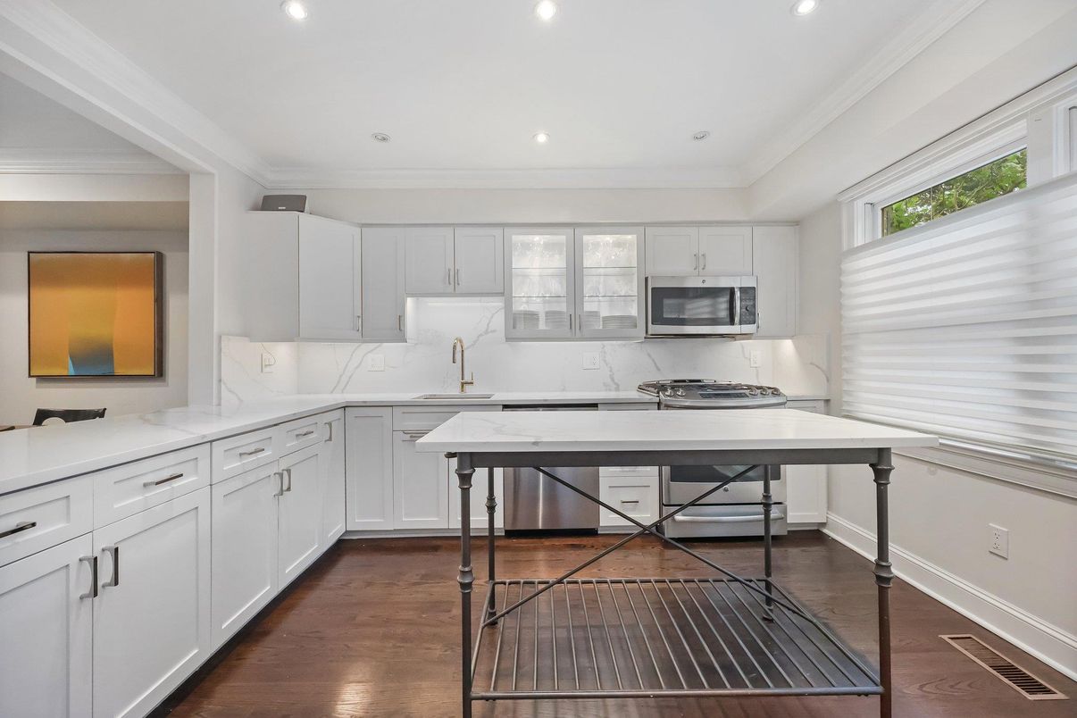Interior, Kitchen, Marble Walls, Recessed Lighting, Stainless Steel Appliances, Wood Texture Flooring