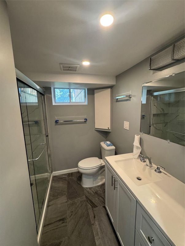 Bathroom, Dual Sink Vanities, Glass Shower, Interior, Recessed Lighting, Wood Texture Flooring