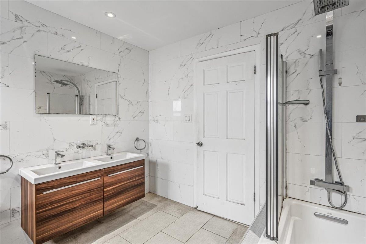 Bathroom, Dual Sink Vanities, Interior, Marble Walls, Recessed Lighting