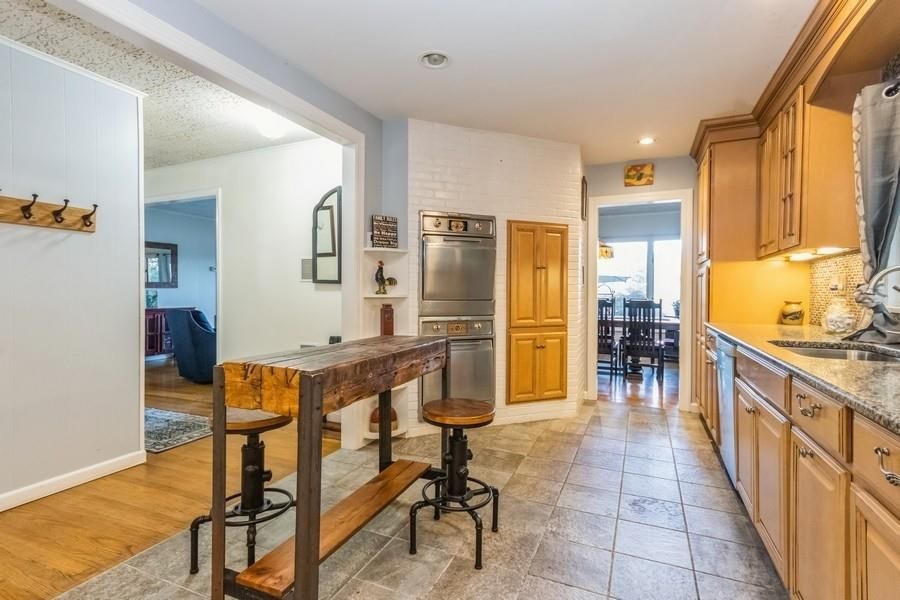 Dining room, Interior, Kitchen, Recessed Lighting, Stainless Steel Appliances, Wood Texture Flooring