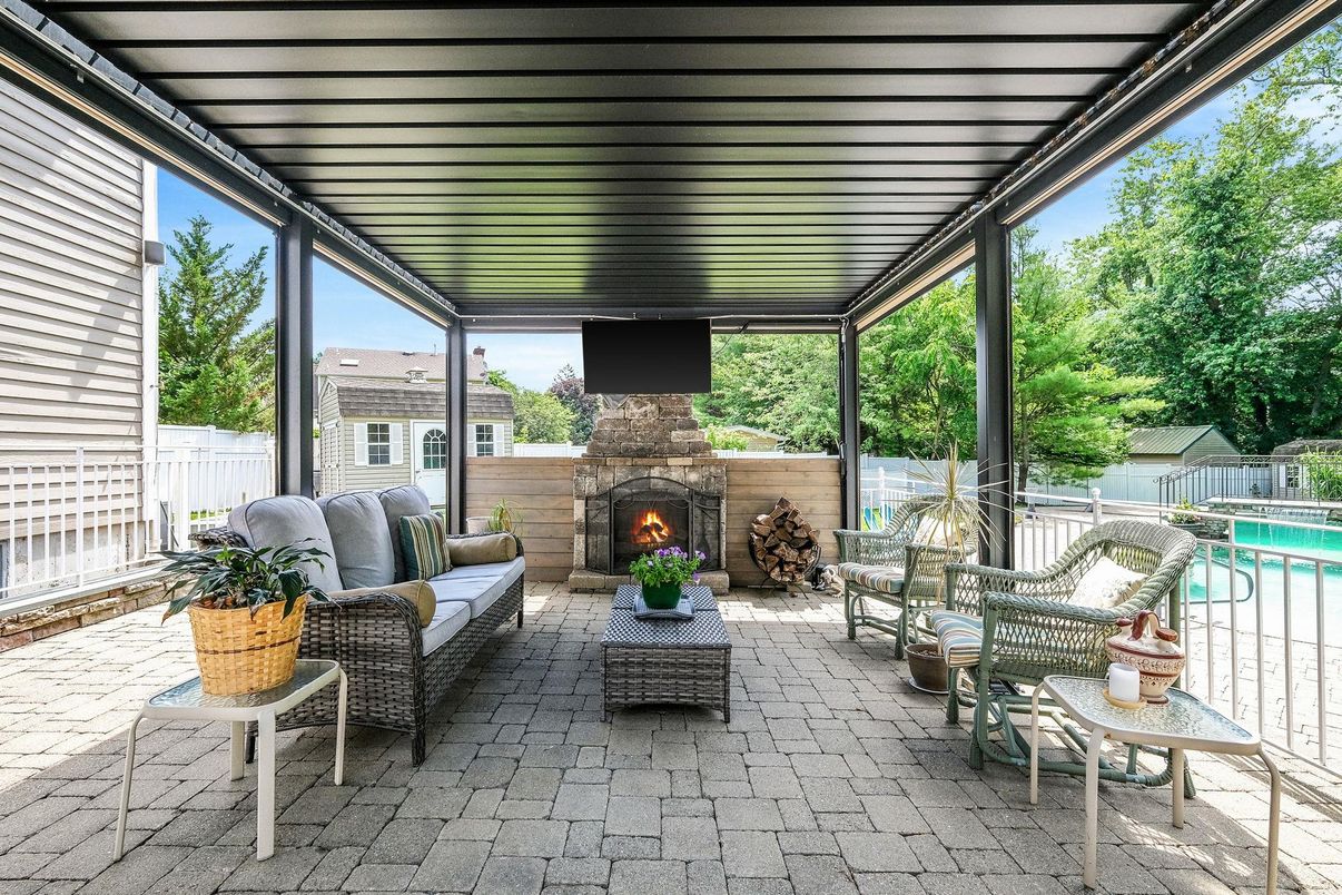 Exterior, Fireplace, Pool, Sun Room
