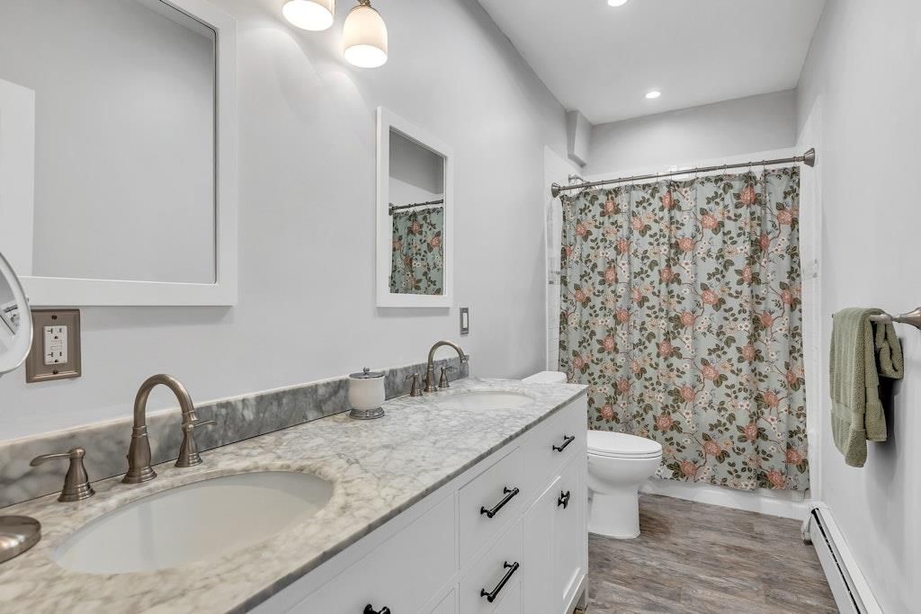 Bathroom, Dual Sink Vanities, Interior, Recessed Lighting, Wood Texture Flooring