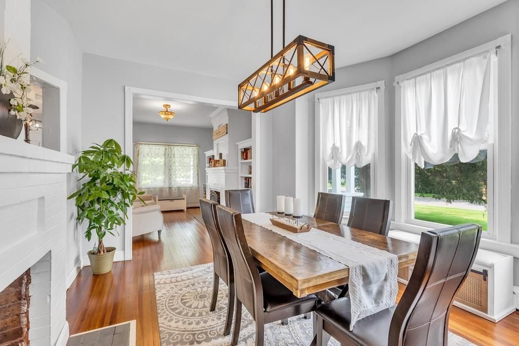 Dining room, Fireplace, Interior, Pendant Lights, Wood Texture Flooring