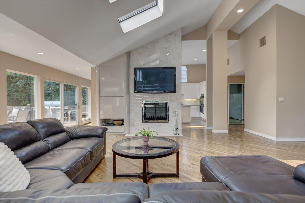 Fireplace, Interior, Living room, Recessed Lighting, Wood Texture Flooring