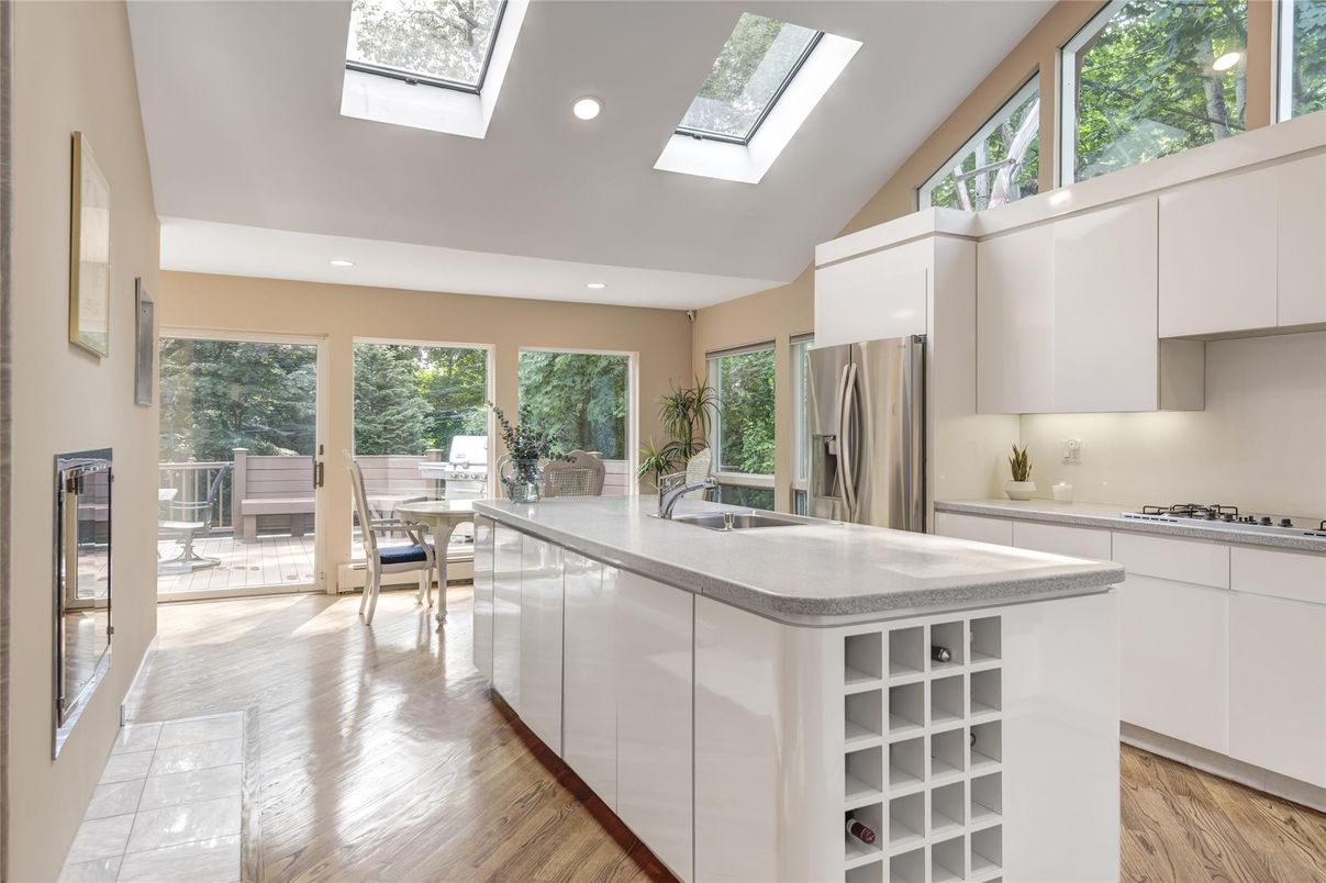 Dining room, Glass Ceilings, Interior, Kitchen, Recessed Lighting, Stainless Steel Appliances, Wood Texture Flooring