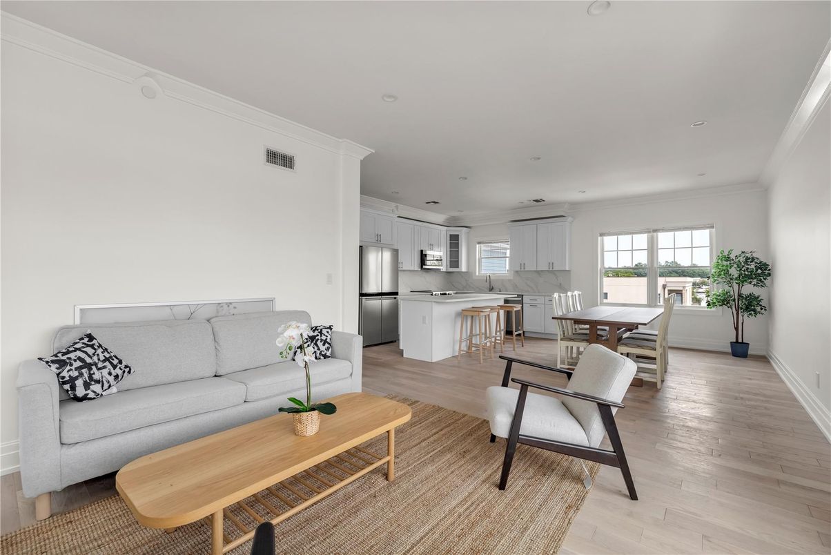 Dining room, Interior, Kitchen, Living room, Recessed Lighting, Stainless Steel Appliances, Wood Texture Flooring