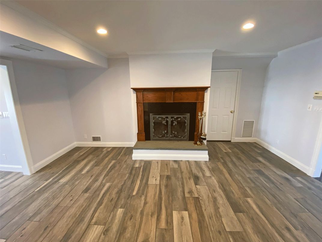 Empty room, Fireplace, Interior, Recessed Lighting, Wood Texture Flooring