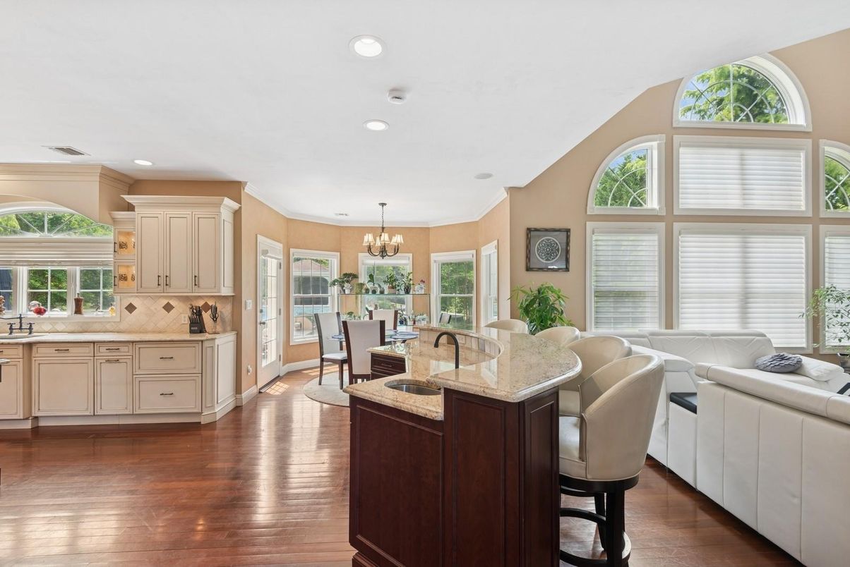 Chandelier, Dining room, Interior, Kitchen, Living room, Recessed Lighting, Wood Texture Flooring