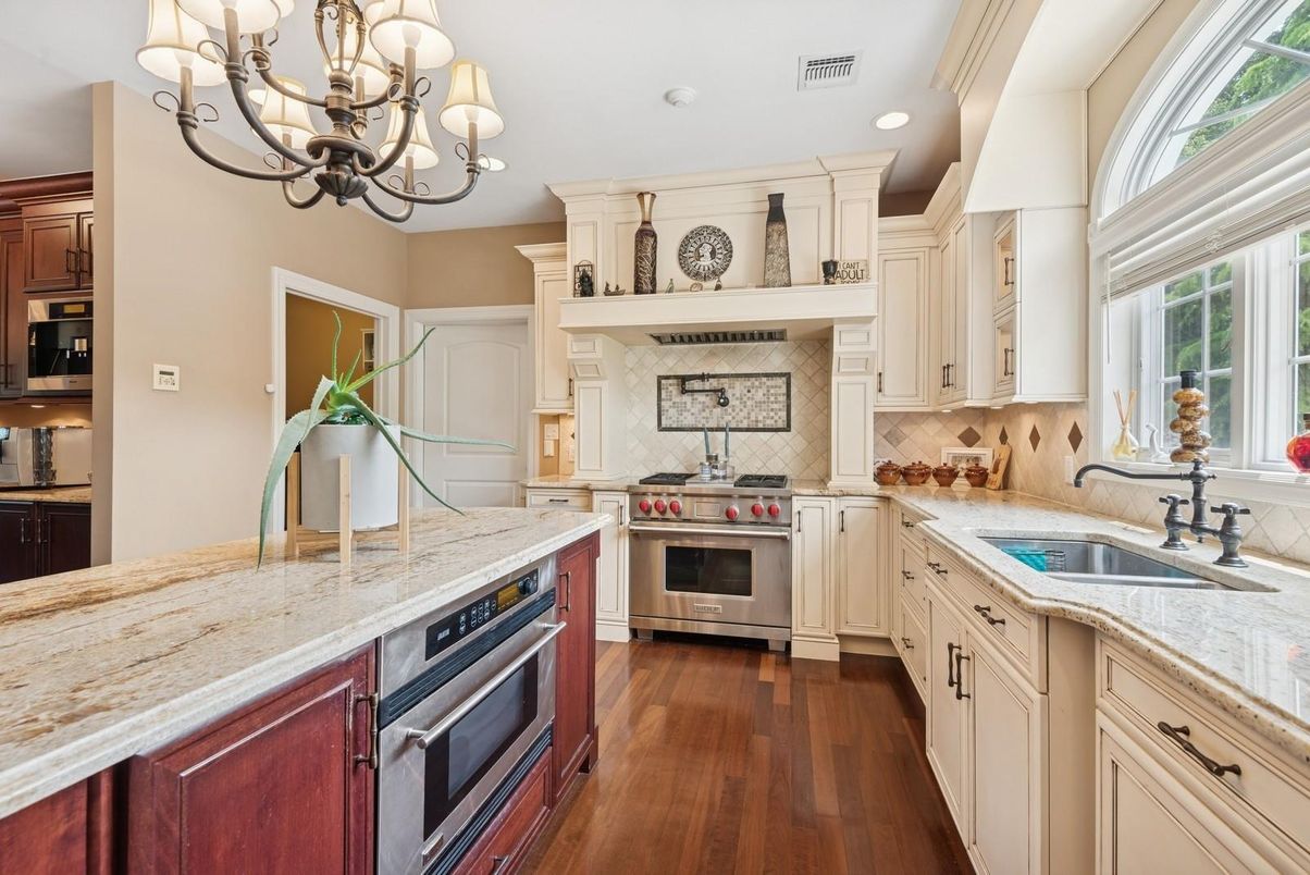 Chandelier, Interior, Kitchen, Recessed Lighting, Stainless Steel Appliances, Wood Texture Flooring