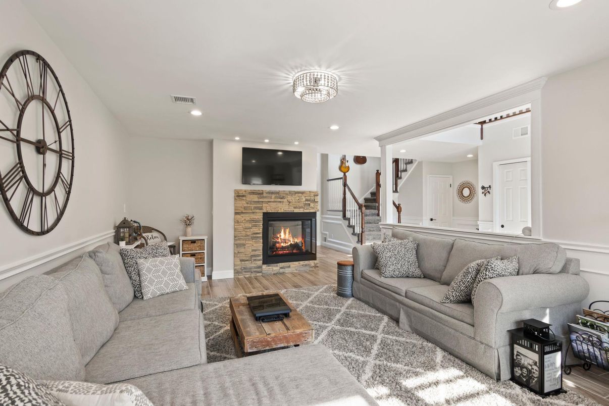 Chandelier, Fireplace, Interior, Living room, Recessed Lighting, Wood Texture Flooring