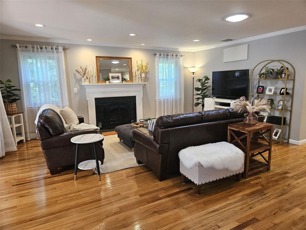 Fireplace, Interior, Living room, Recessed Lighting, Wood Texture Flooring