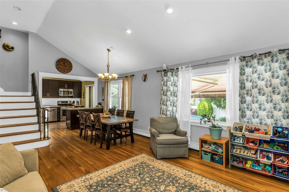 Chandelier, Dining room, Interior, Kitchen, Pendant Lights, Recessed Lighting, Stainless Steel Appliances, Wood Texture Flooring
