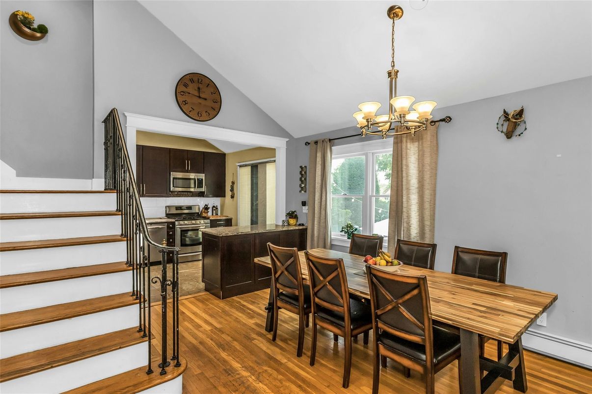 Chandelier, Dining room, Interior, Kitchen, Stainless Steel Appliances, Wood Texture Flooring