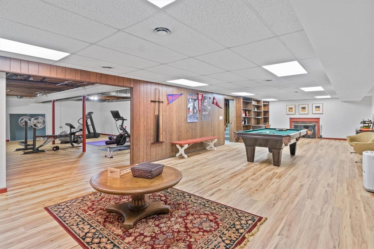 Billiard Table, Fitness Equipment, Game Room, Interior, Recessed Lighting, Wood Texture Flooring, Wooden Walls