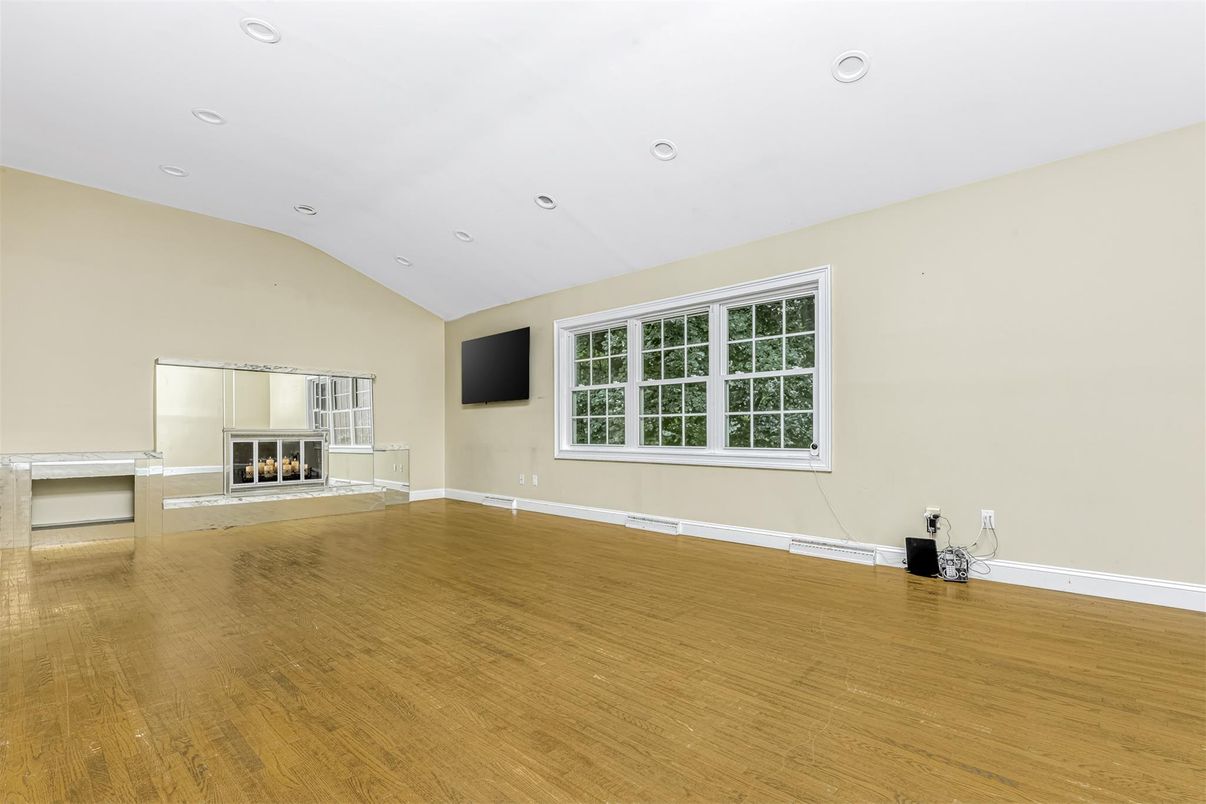 Empty room, Fireplace, Interior, Recessed Lighting, Wood Texture Flooring