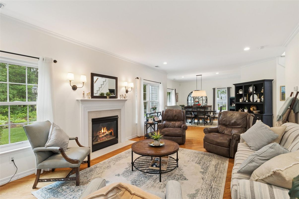 Dining room, Fireplace, Interior, Living room, Pendant Lights, Recessed Lighting, Wood Texture Flooring